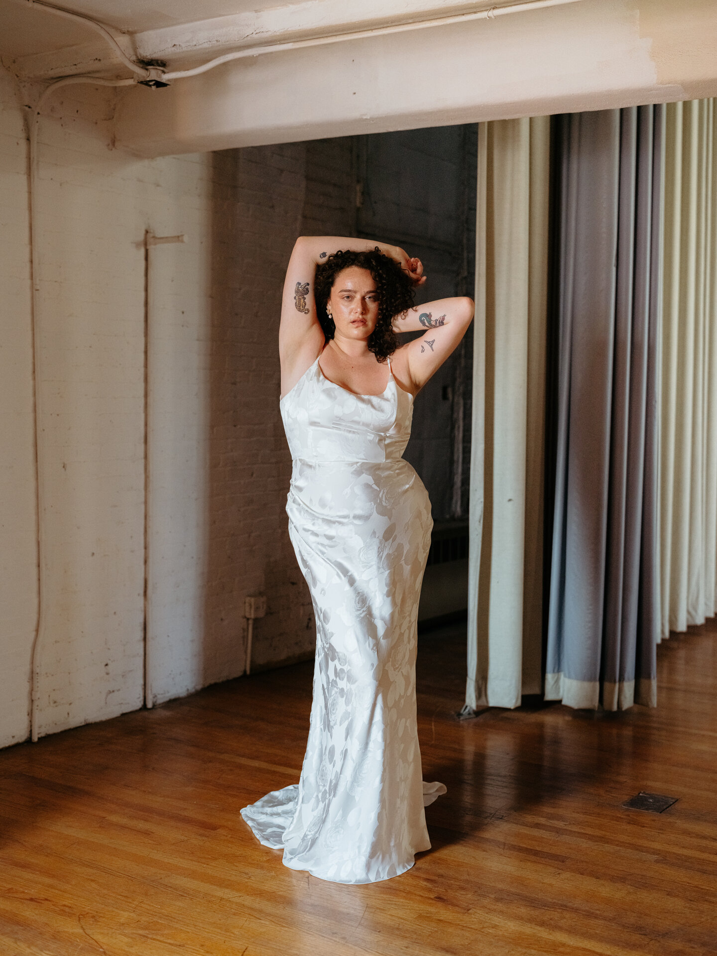 A person wearing a Loulette wedding dress.